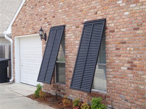 metal shutter house forida|florida shutters company.